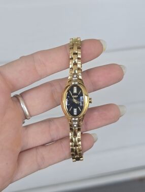 Ladies Gruen Black & Gold Watch 100ft Water Resistant